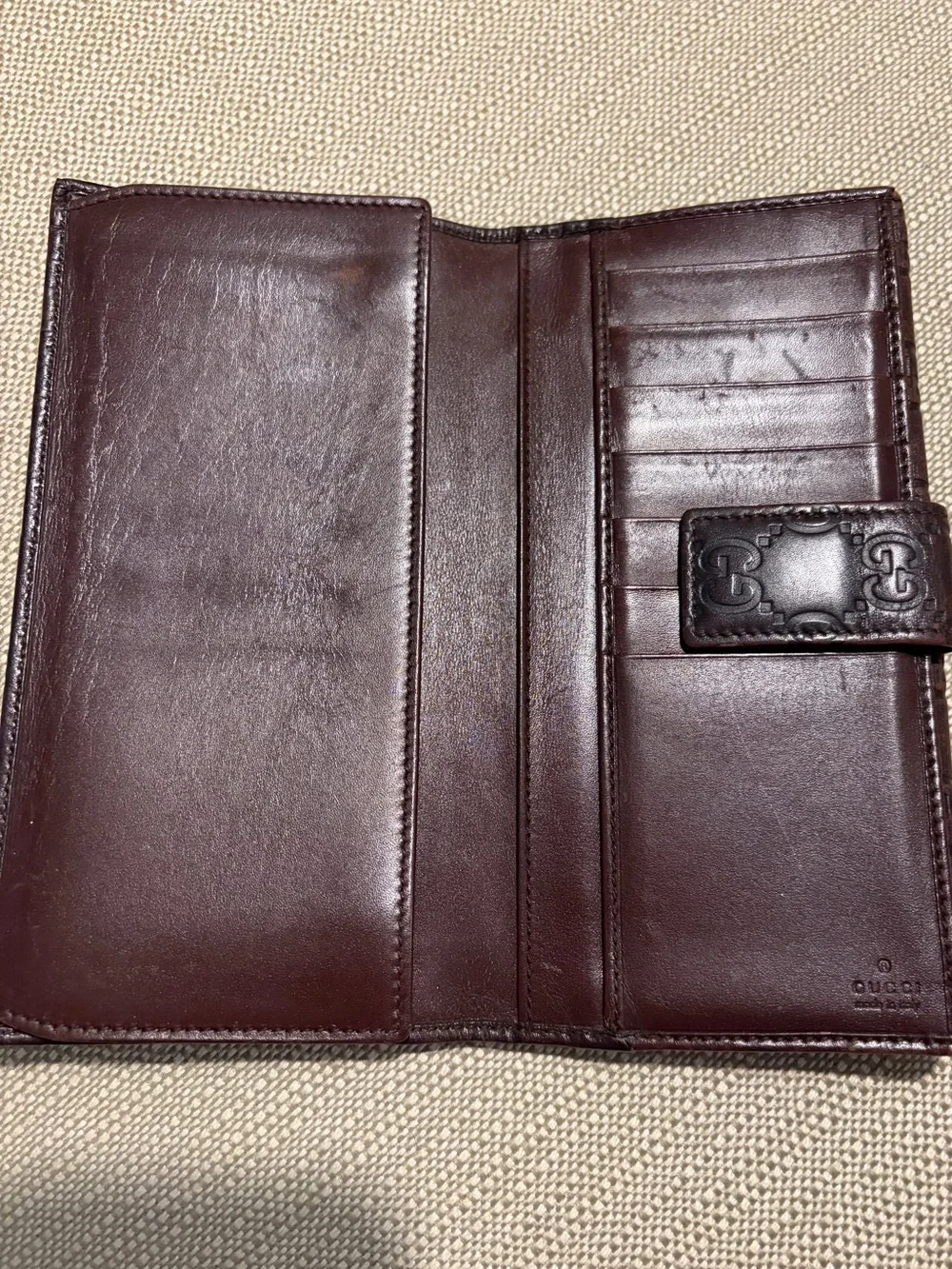 Authentic Gucci Brown Leather Continental Wallet with Embossed GG